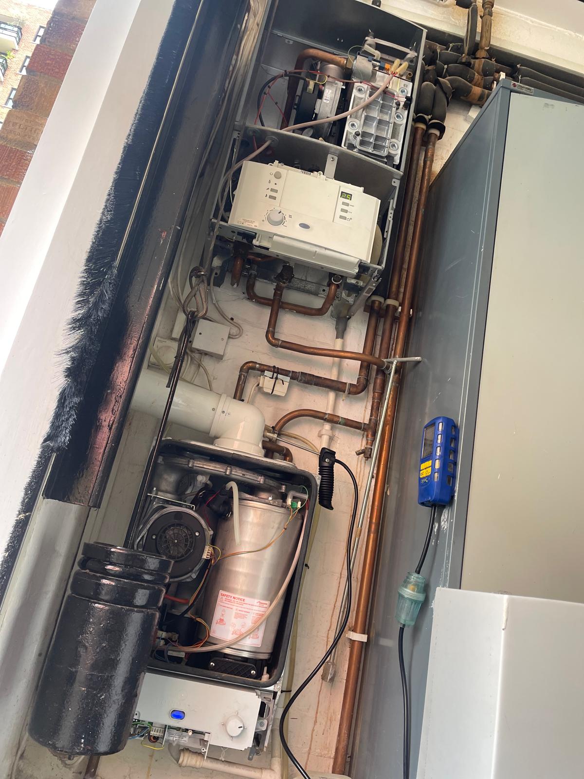 Boiler room with dual boiler installation and pipework by MAMOSS heating engineers in London