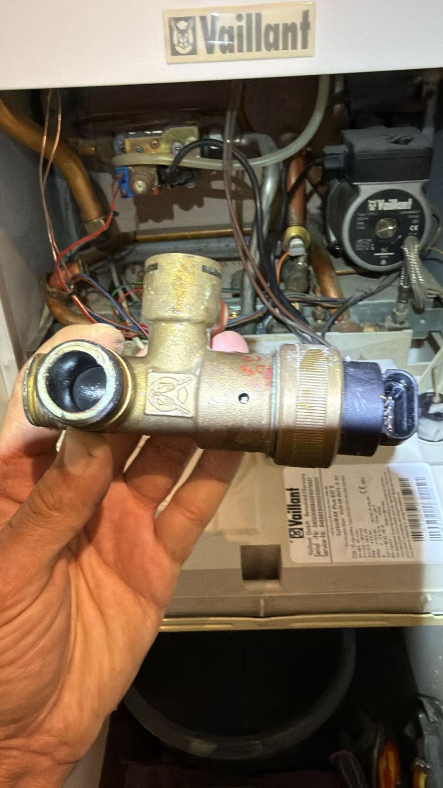 Vaillant boiler diverter valve removed for inspection and replacement