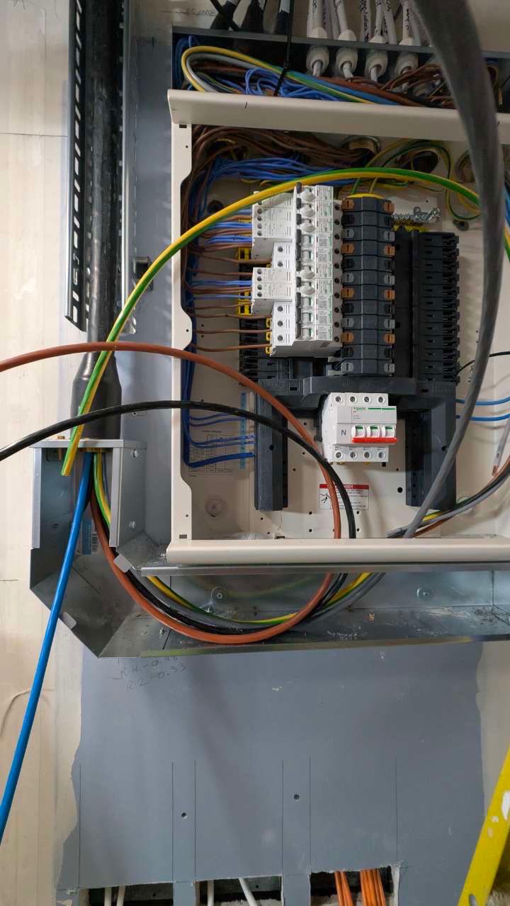 Electrical panel installation in progress showing SWA cable terminations in London
