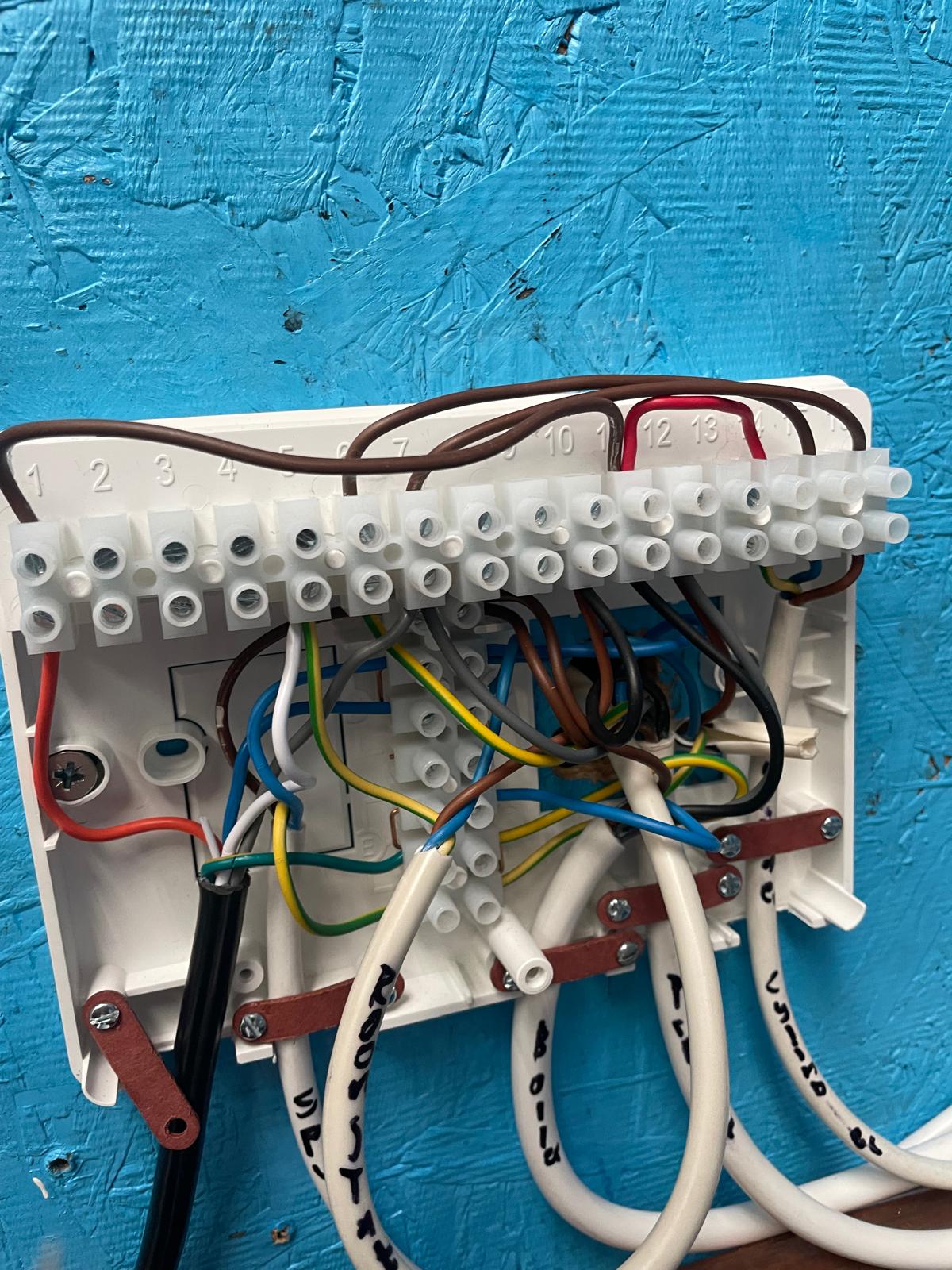 Heating system wiring centre with labelled boiler and valve connections