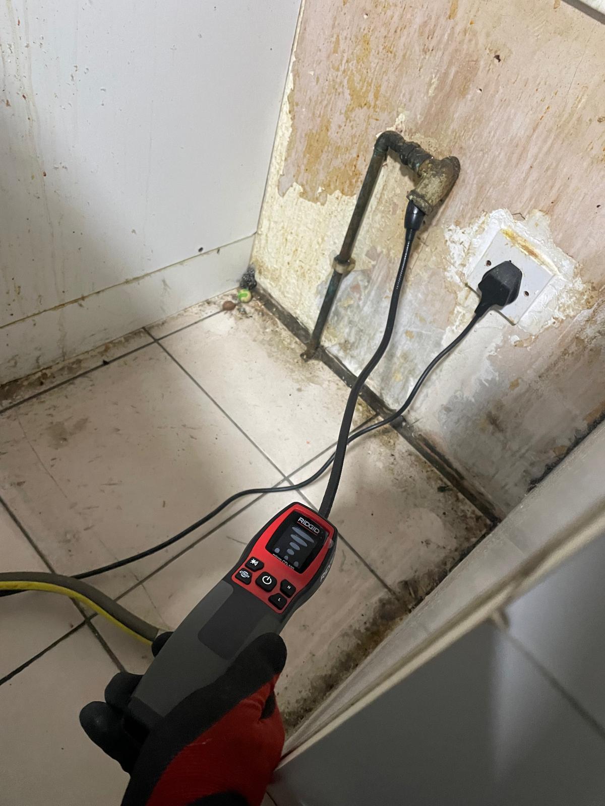 RIDGID leak detection probe locating water leak behind wall in London property