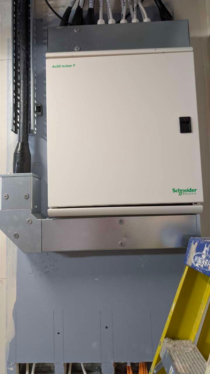 Schneider Acti9 Isobar P distribution board installed and closed in a London new-build