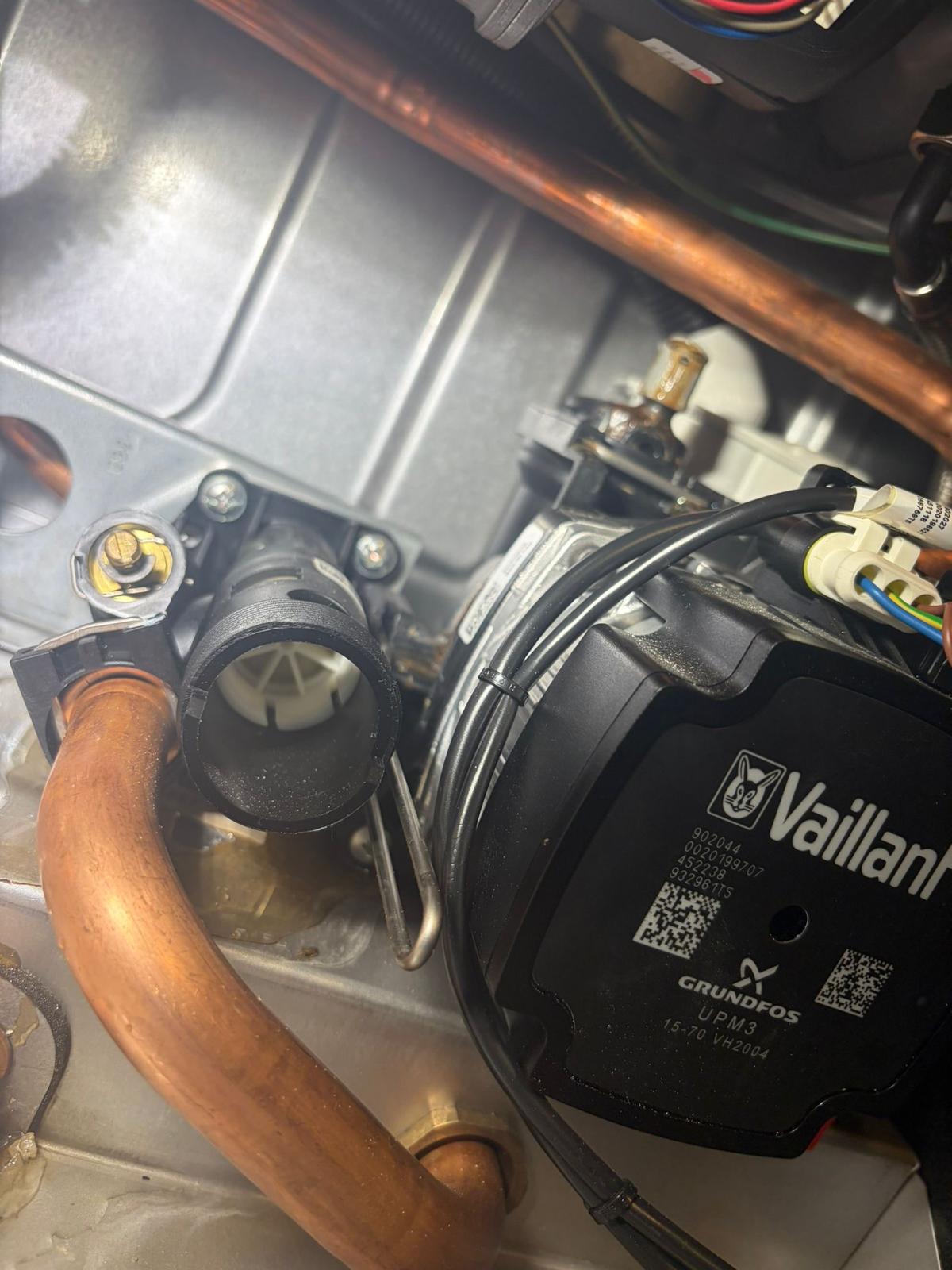 Vaillant boiler Grundfos UPM3 circulation pump during replacement by MAMOSS engineer